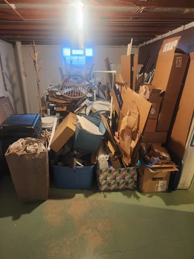 Roll-off dumpster container at job site for 20 Yard Dumpster Rental in Lehi